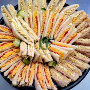 Sandwich platter Cape Town with tomato & cheese, egg mayo and spiced beef